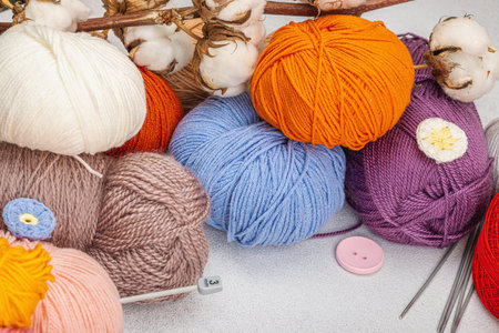 A set of colorful clew of thread for knitting and special craft tools. Handmade, hobby, crochet...