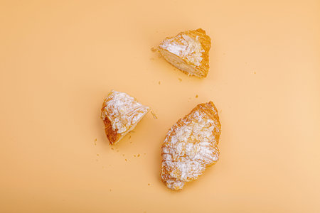 good morning concept. Fresh croissants with cream filling and almond flakes. Sweet dessert,...