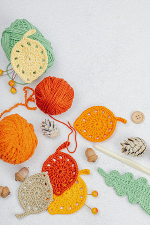 Set of clew of thread for knitting. Crocheted different leaves, handmade, autumn hobby concept....