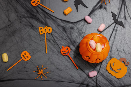 Traditional festive composition for Halloween party. Sweet seasonal food, homemade autumn decor....