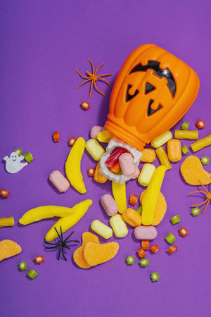 Traditional festive composition for Halloween party. Sweet seasonal food, homemade autumn decor....