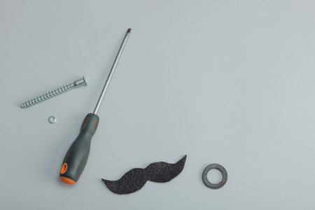 Happy Fathers Day concept. Set of manual tools, tie, spare parts, traditional symbols. Greeting...