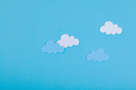 Weather symbols concept. Handmade props, hobby, crafted decor. Blue background, top viewの写真素材