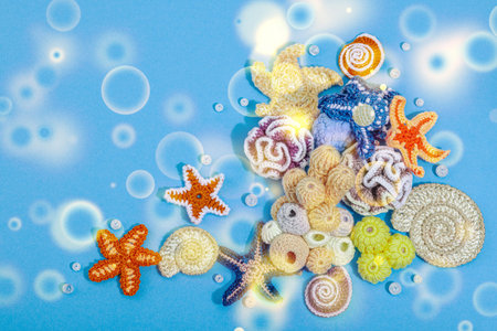 Summer crochet concept. Handmade coral reef, marine style, underwater animals. Nautical blue...