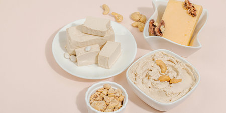 Set of assorted homemade vegan nuts cheese. Raw healthy sauce in a bowl, lactose free food. Bio...