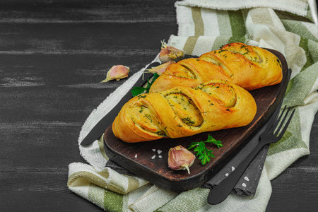 Fresh baked garlic bread, gluten free buns. Tasty food, fresh parsley, fragrant spices. Homemade...