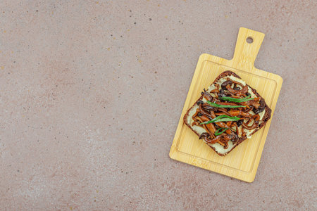 Healthy plant-based open sandwiches with sautÃ©ed Shimeji mushrooms. Protein rich vegan meal is...