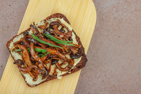 Healthy plant-based open sandwiches with sautÃ©ed Shimeji mushrooms. Protein rich vegan meal is...