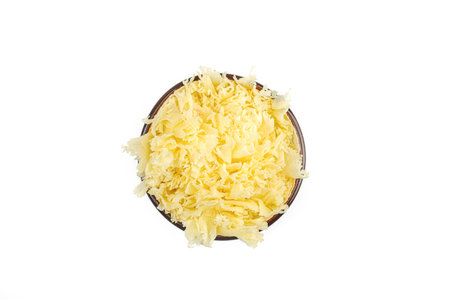 Rosettes of Tete de Moine cheese shaved with a girolle isolated on white background, highlighting the gourmet texture and appetizer concept, top viewの写真素材
