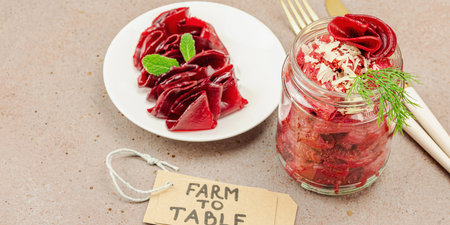 Fermented beetroot pasta salad in a jar with sliced beets. Probiotics and healthy plant-based...