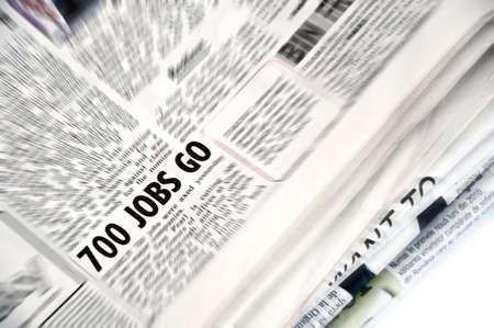 Newspaper article with 700 jobs go highlightedの写真素材