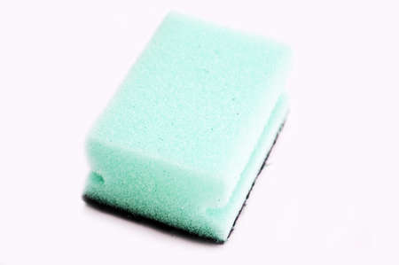 Isolated blue sponge on white backgroundの写真素材