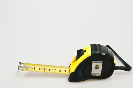 Measure tape open at 9 cm