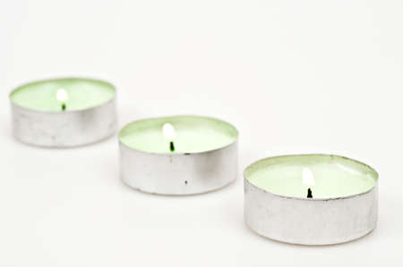 Bunch of candles with flameの写真素材