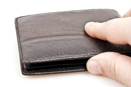 Male hand on leather walletの写真素材