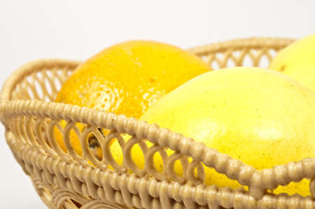 Isolated basket with pears and oranges fruitsの写真素材