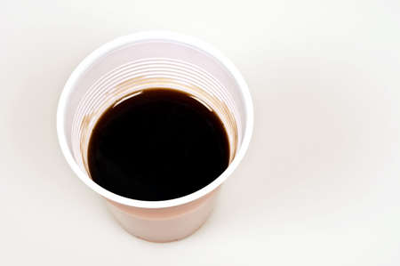 Disposable cup of coffee isolated on white backgroundの写真素材