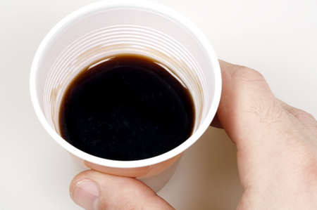 Disposable cup of coffee isolated on white backgroundの写真素材