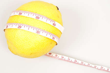 Isolated lemon and cm rulerの写真素材
