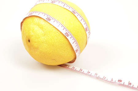 Isolated lemon and cm rulerの写真素材