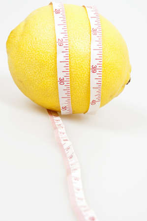 Isolated lemon and cm rulerの写真素材