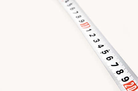 Measure tape isolated on white backgroundの写真素材