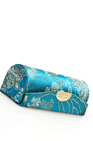 Isolated turquoise wallet on white backgroundの写真素材