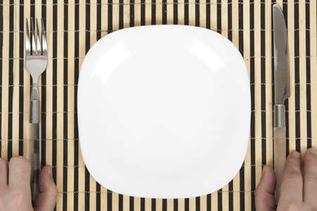Isolated table arrangement with striped wooden supportの写真素材