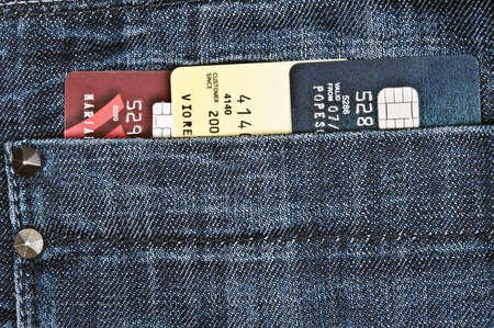 Credit cards in jeans back pocketの写真素材