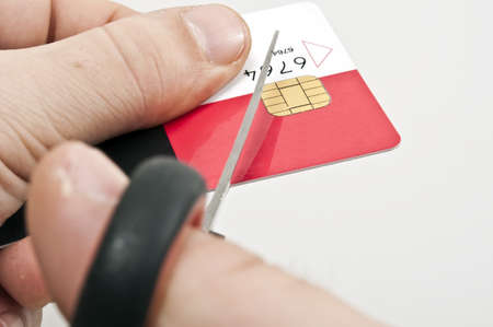 Male hand cut credit cardの写真素材