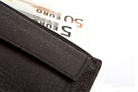 Wallet open full of banknotesの写真素材