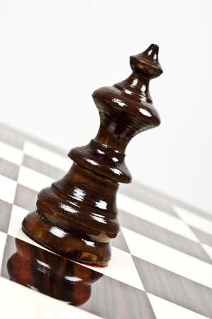 Black queen closeup on chessboardの写真素材