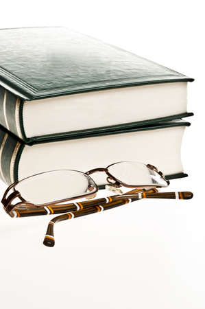 Isolated green books and eyeglassesの写真素材
