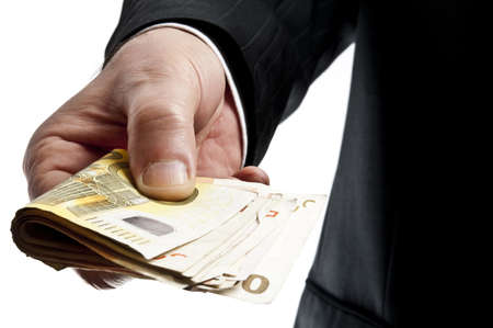 Business man offering bunch of euro banknotesの写真素材