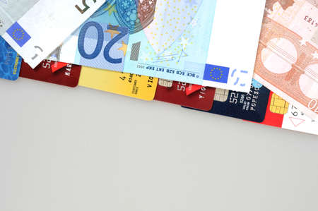 Close up to euro banknotes and credit cardsの写真素材
