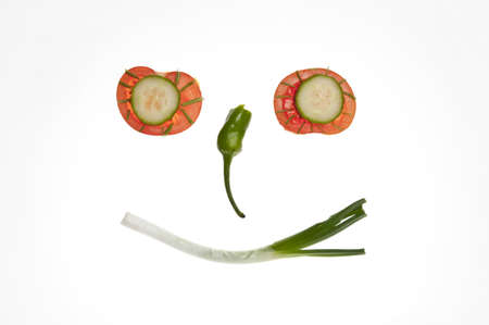Isolated smile face made of vegetablesの写真素材