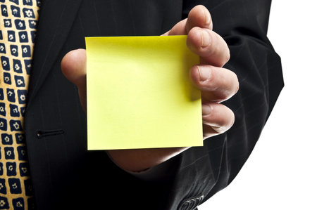 Business man with empty sticker in hand
