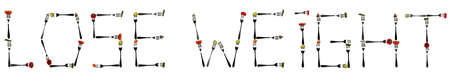 Lose weight word made of different type of food in forksの写真素材