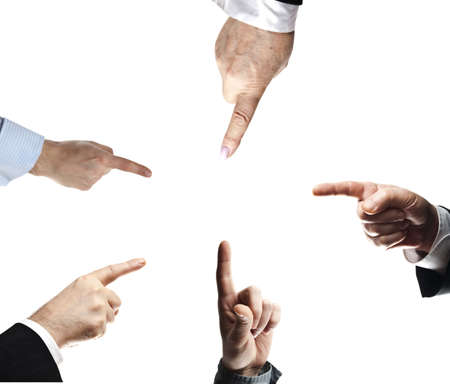 5 business people hands pointing in middleの写真素材