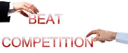 Beat competition words made by business woman and man handsの写真素材