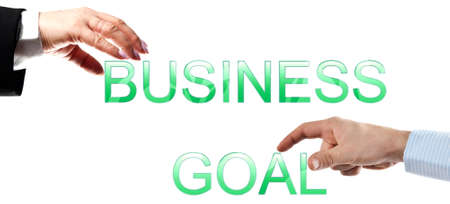 Business goal words made by business woman and man handsの写真素材