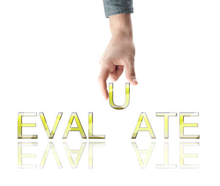 Evaluate word made by male handの写真素材