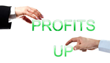 profits up words made by business woman and man handsの写真素材