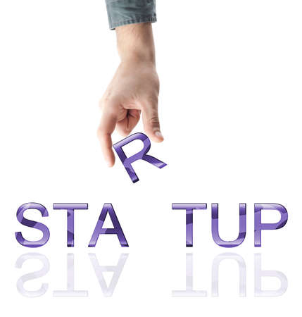 Startup word made by male handの写真素材