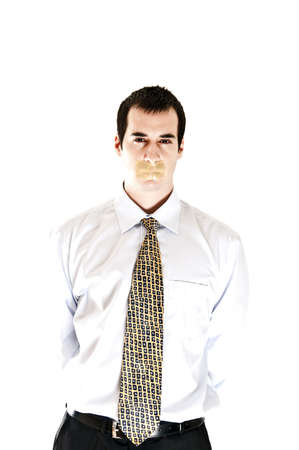 Isolated business man with duct tape on mouthの写真素材