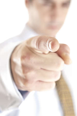 Isolated young business man pointingの写真素材