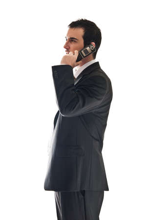 Isolated profile of business man speaking on phoneの写真素材