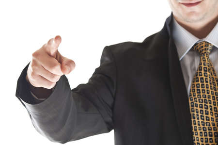 Isolated young business man pointingの写真素材