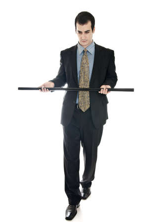 Isolated business man try to keep balanceの写真素材