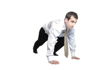 Isolated profile of young business man  ready to start runningの写真素材